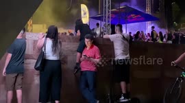 Dad in Greece lifts son hilariously on shoulders to watch rap concert