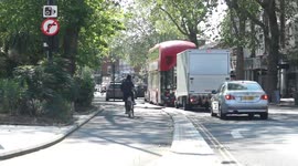 Some cyclists use the allegedly temporary and controversial C9 cycle lane in Chiswick High Road whilst those in cars and buses crawl along the road.