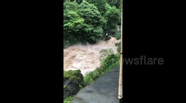 Japan's Shizuoka Rivers Swell to Alarming Levels: Dramatic footage captures torrential rain's impact