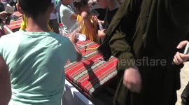 Children of Palestinian prisoners held in Israeli jails throw letters for their parents in Gaza, Palestine