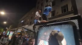 Manchester city fans in Manchester celebrating winning treble