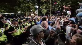 Tension in Piccadilly Gardens as Man City fans square off with police