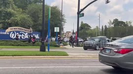 Outrage as supporters of Ron DeSantis hold nazi flags outside Disney in Orlando, US