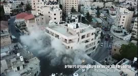 A handout video made available by the Israeli army shows the Israeli army on June 8, 2023 demolished the home of a Palestinian prisoner accused of carrying out twin bombings in Jerusalem that killed two Israelis last November.