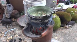 Wild mushrooms freshly picked from a forest being boiled in a saucepan.