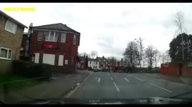 Cyclist Rides into Oncoming Traffic on a One Way Street Dash Cam Footage