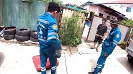 Officers drill through concrete storm drain to rescue trapped monitor lizard