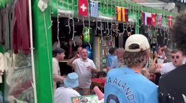 Man City fans party all day in Istanbul after winning the UEFA Champions League final. Many flares were used in the good hearted celebrations outside the popular bars. There were no incidents of trouble or violence