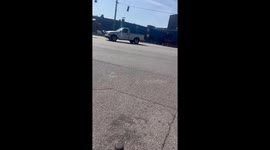 Train Drags a Car Along the Tracks