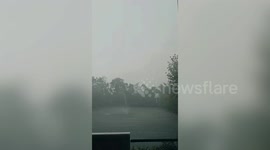 Storms breaks off tree branch during heavy rain in Thailand
