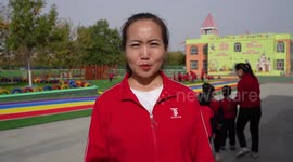 Xinjiang, My home: Kindergarten teacher offers motherly care to kids