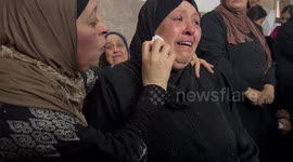 Palestinians carry the body of Faris Hashash who was killed during clashes with Israeli forces during his funeral
