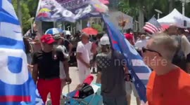 People protest outside President Donald Trump’s arraignment at Federal Court in Miami