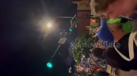 Overly excited fan climbs lamppost and makes it sway during Denver Nuggets' celebrations