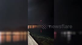Philippines Mayon Volcano crater glows bright orange as it spews lava