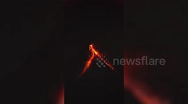 Lava spills from crater of Mayon Volcano during eruption in the Philippines