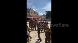 Kids And Soldiers Sing And Dance in The Old City in Jerusalem, Israel