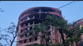 Officials inspect damaged Odesa warehouse struck by missile, killing 3