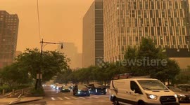 Lower Manhattan Shrouded in Wildfire Smoke in New York, NY, USA