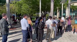 People and Press Gather Outside Courthouse for Trump Indictment in Miami, FL, USA