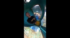 Guy Gets Stuck in Winding Water Slide