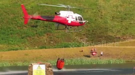 Helicopters battle to extinguish wildfires in Wales' Garw Valley