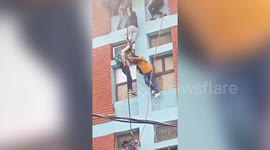 Panicked students rappel down building after large fire broke out at coaching institute in India