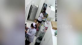 Cupboard falls from wall and hits nurse on the head