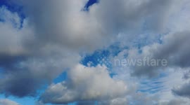 Time-lapse of sky Lots of white cloud, blue sky the odd contrail