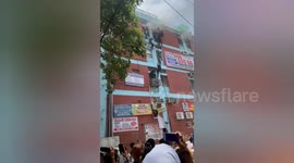 Panicked students rappel down building after large fire broke out at coaching institute in India
