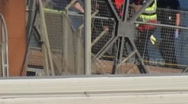 Migrant in a wheelchair being brought in to dover today by border force