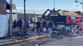 People clear areas affected by catastrophic tornado in Perryton, Texas
