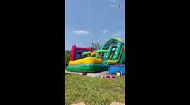 Woman trying water slide gets a face plant *Funny Water Slide Fail*