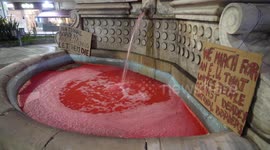 Greece migrant shipwreck: Enraged activists pour red liquid into fountains to emulate blood