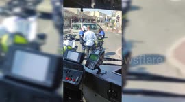 A bus driver is fined after running a red light by police bikers in Paris suburb between Versailles and Saint-Cyr-L'École, France.  (Inner bus view)  16 june 2023, 11h30 am