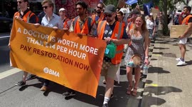 Junior doctors on strike march through central London