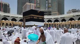 Muslim pilgrims attends Friday prayer around the Kaaba, Islam's holiest shrine, at the Grand mosque in the holy Saudi city of Mecca, during annual Hajj pilgrimage