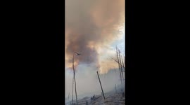 Planes Work to Prevent Spread of Canadian Wildfires