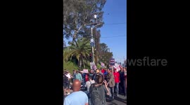 Catholic protesters gather outside Dodger Stadium in LA ahead of Pride