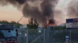 Fire breaks out at industrial building in Manchester, England