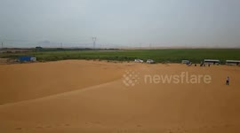 Sci-tech innovation turns desert sands into arable land
