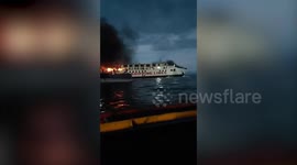 Coast guard rescues 120 passengers when ferry catches fire in the Philippines