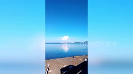 Vivid blue sky seen as smog eases over Philippines Taal Volcano