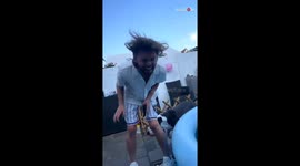 Man tumbles into a swimming pool while laughing *hilarious fail*