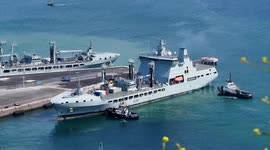 RFA Tidesurge leaving harbour Portland Port, Dorset a supply and refueling ship for the Royal Navy