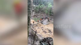 Stranded tourists rescued after road gets washed away in northeastern India