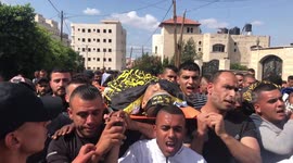 Palestinians attend the funeral of men killed during an Israeli military raid in Jenin, in the West Bank