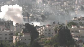 Smoke rises during Israeli army raid in Jenin in the West Bank