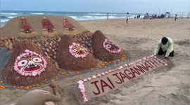 Indian Sand artist created beautiful Two Hundred fifty coconut installed in the sand art of Ratha Yatra
