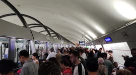 Paris: Subway Metro station Olympiades unusually full.